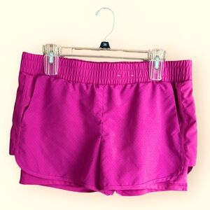 Xersion fuchsia quick-dry running shorts with built in spandex. Size Large.